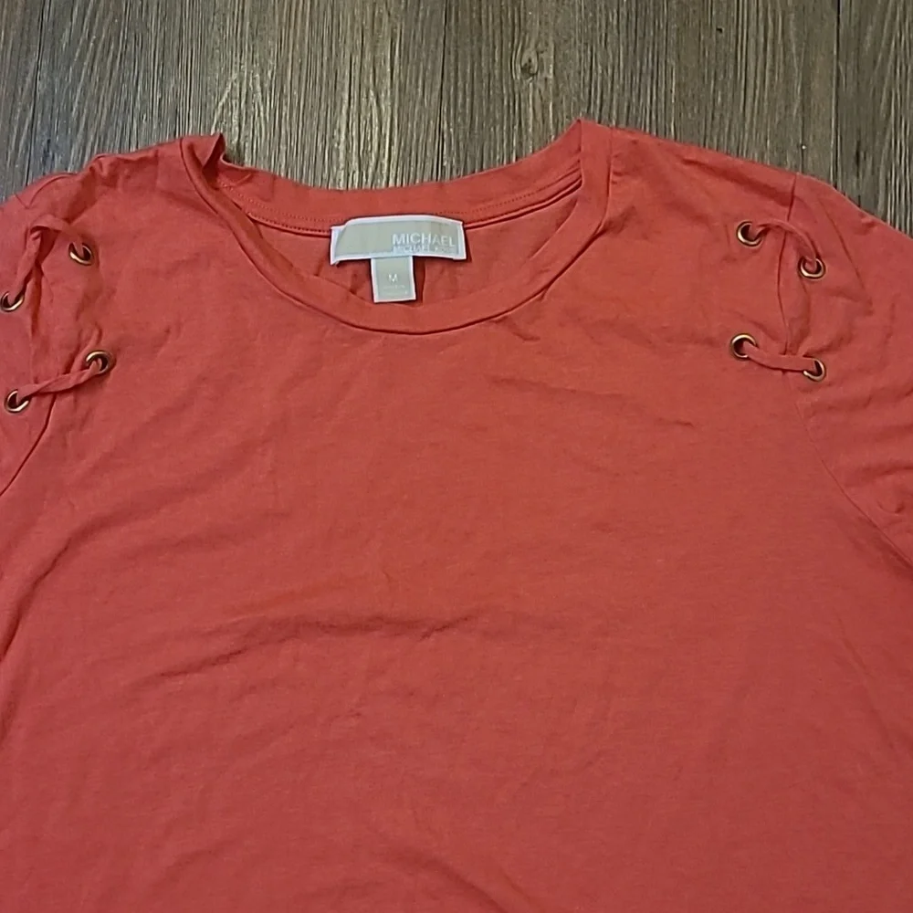 Michael Kors Orange Short Sleeve Top with Lace-Up Detail used good condition‎